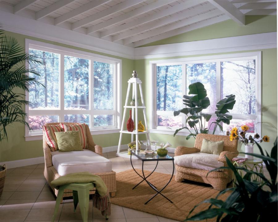 White awning windows letting natural light into sitting room
