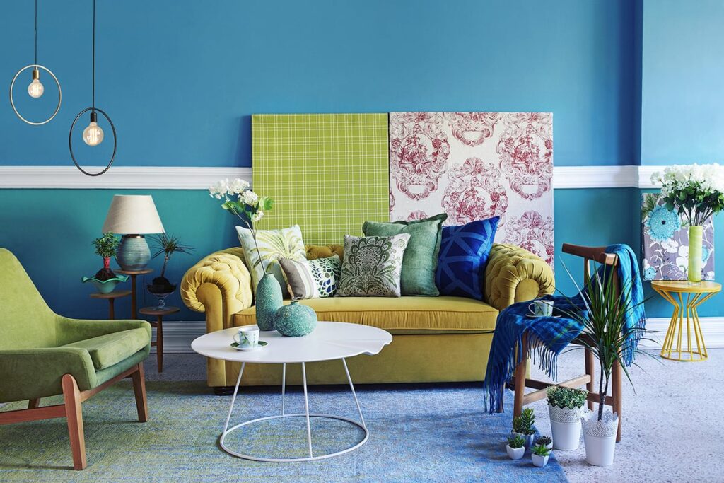 room with blue walls and mixed patterns